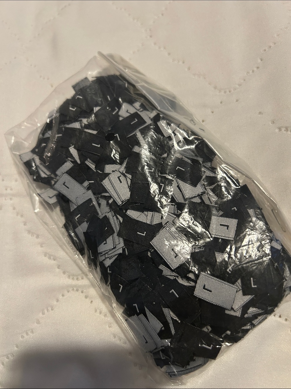 Black Size “L” Labels.